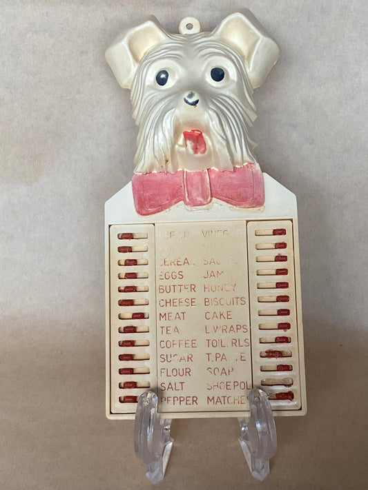 Vintage celluloid Scotty wall plaque grocery list