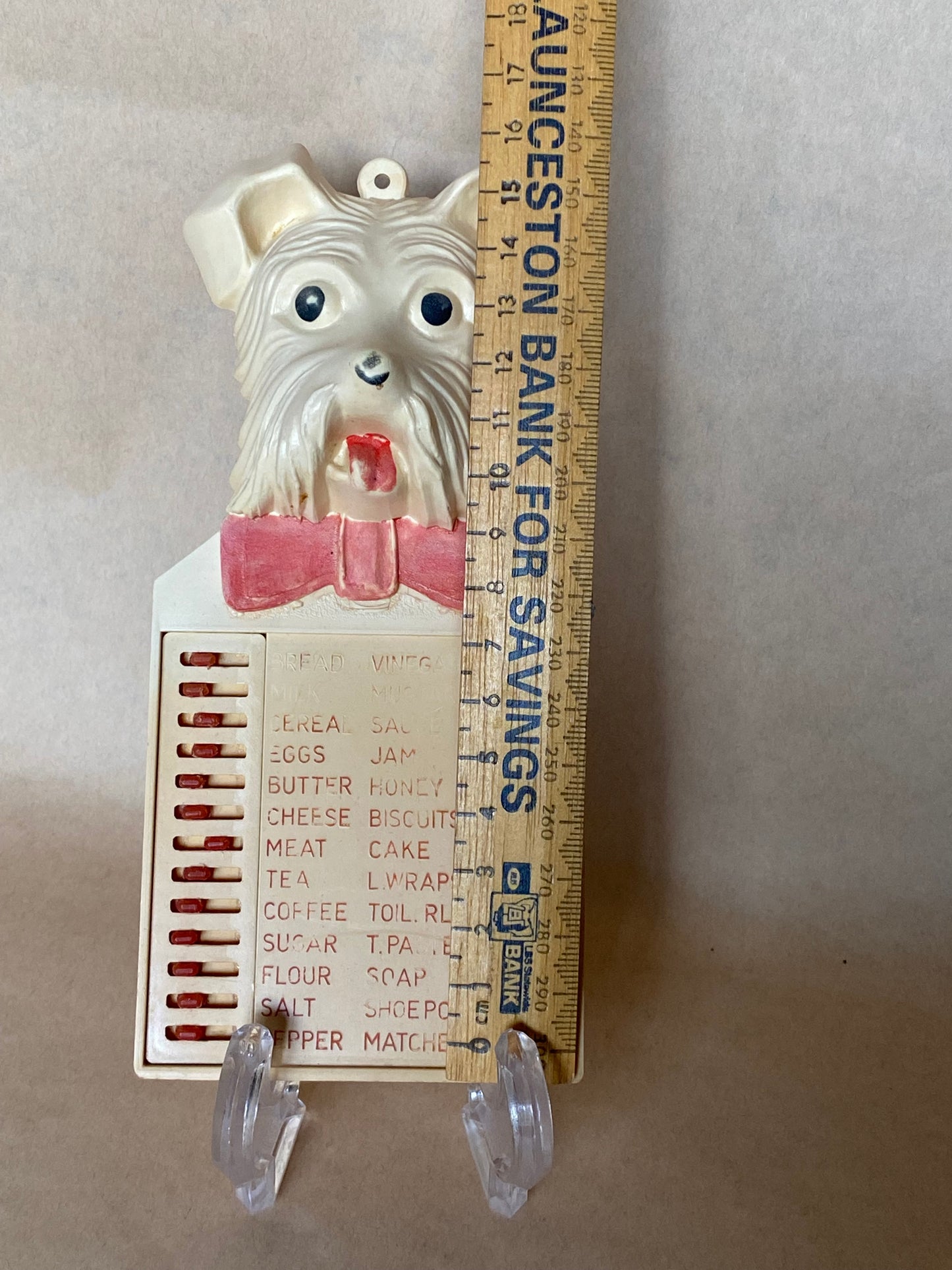 Vintage celluloid Scotty wall plaque grocery list