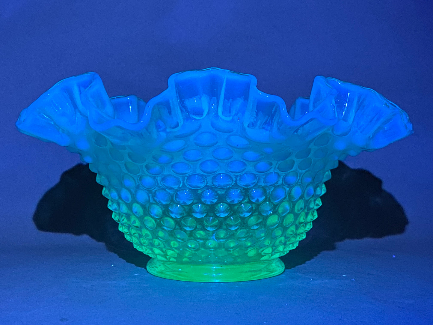 Beautiful Fenton blue opalescent hobnail bowl with original card with uranium base