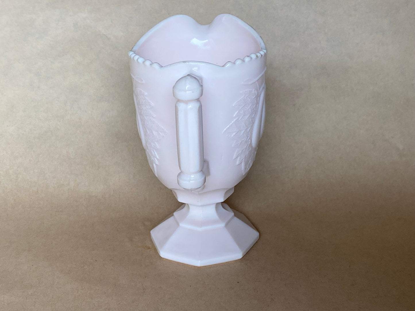Vintage Jeannette Shell Pink Milk Glass Footed Creamer in the Baltimore Pear pattern.