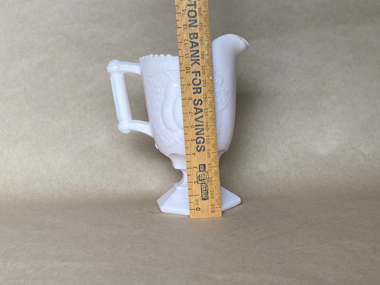 Vintage Jeannette Shell Pink Milk Glass Footed Creamer in the Baltimore Pear pattern.