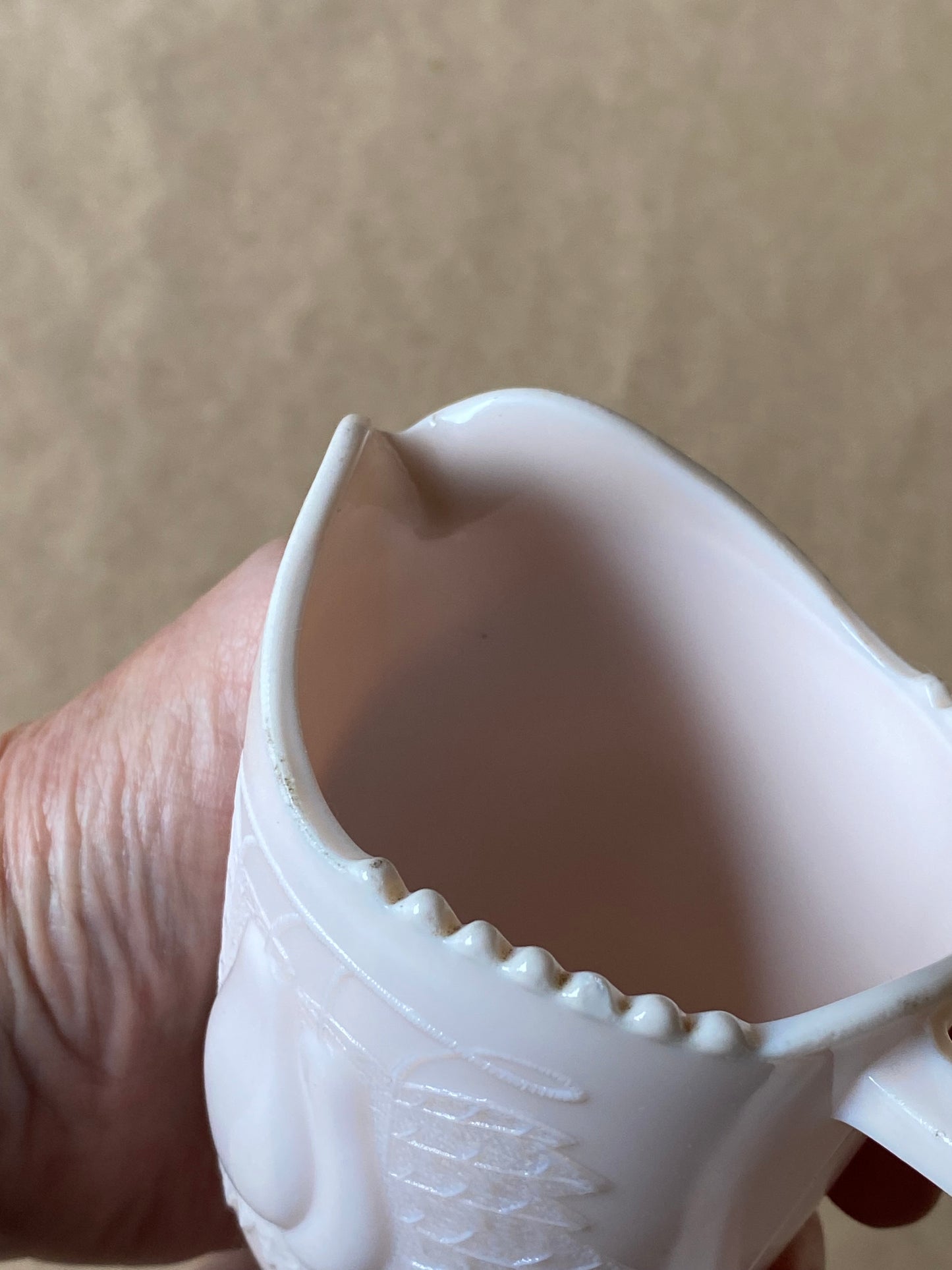 Vintage Jeannette Shell Pink Milk Glass Footed Creamer in the Baltimore Pear pattern.