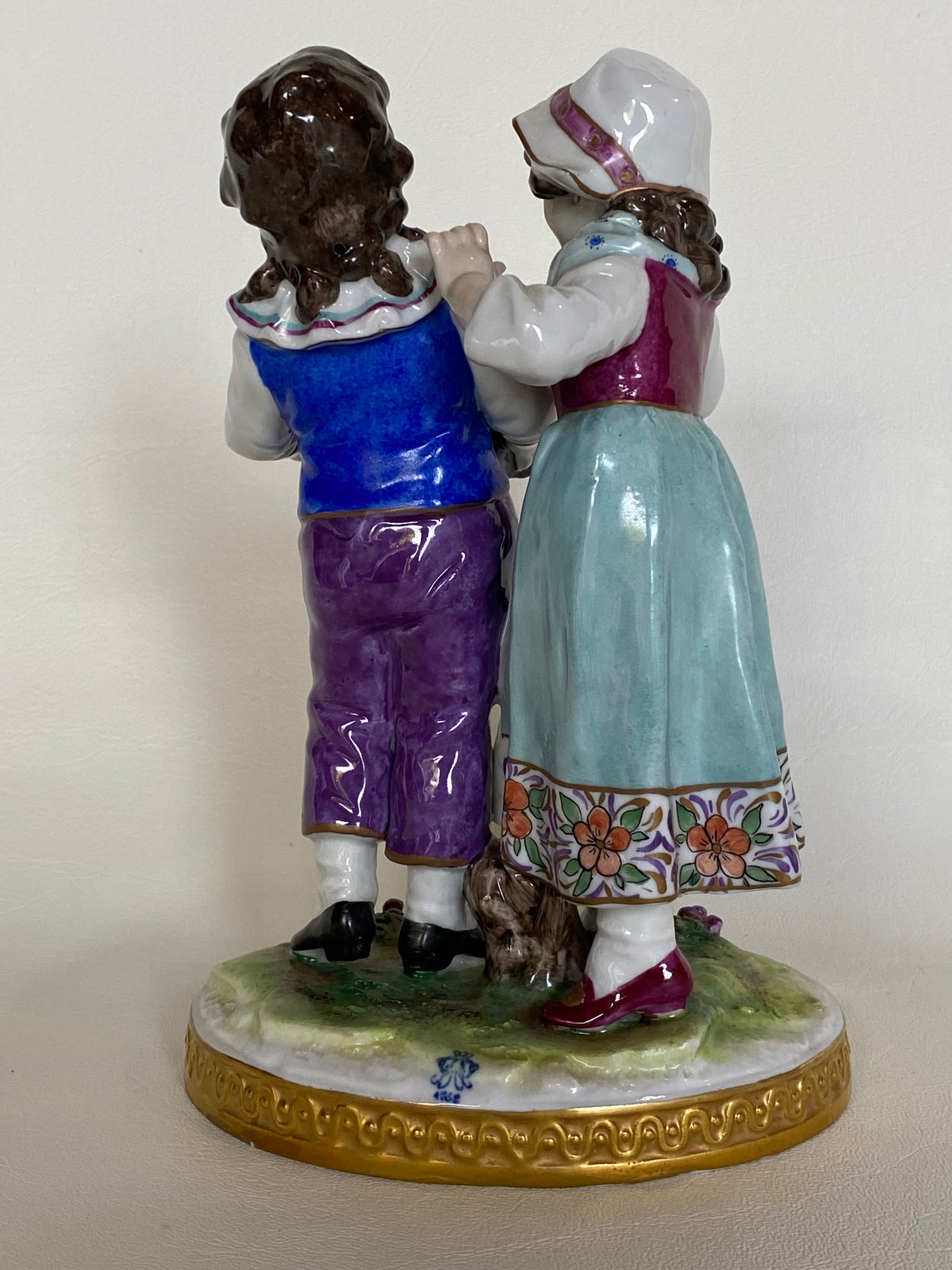 Volkstedt Figurine - Girl and boy harvesting grapes.