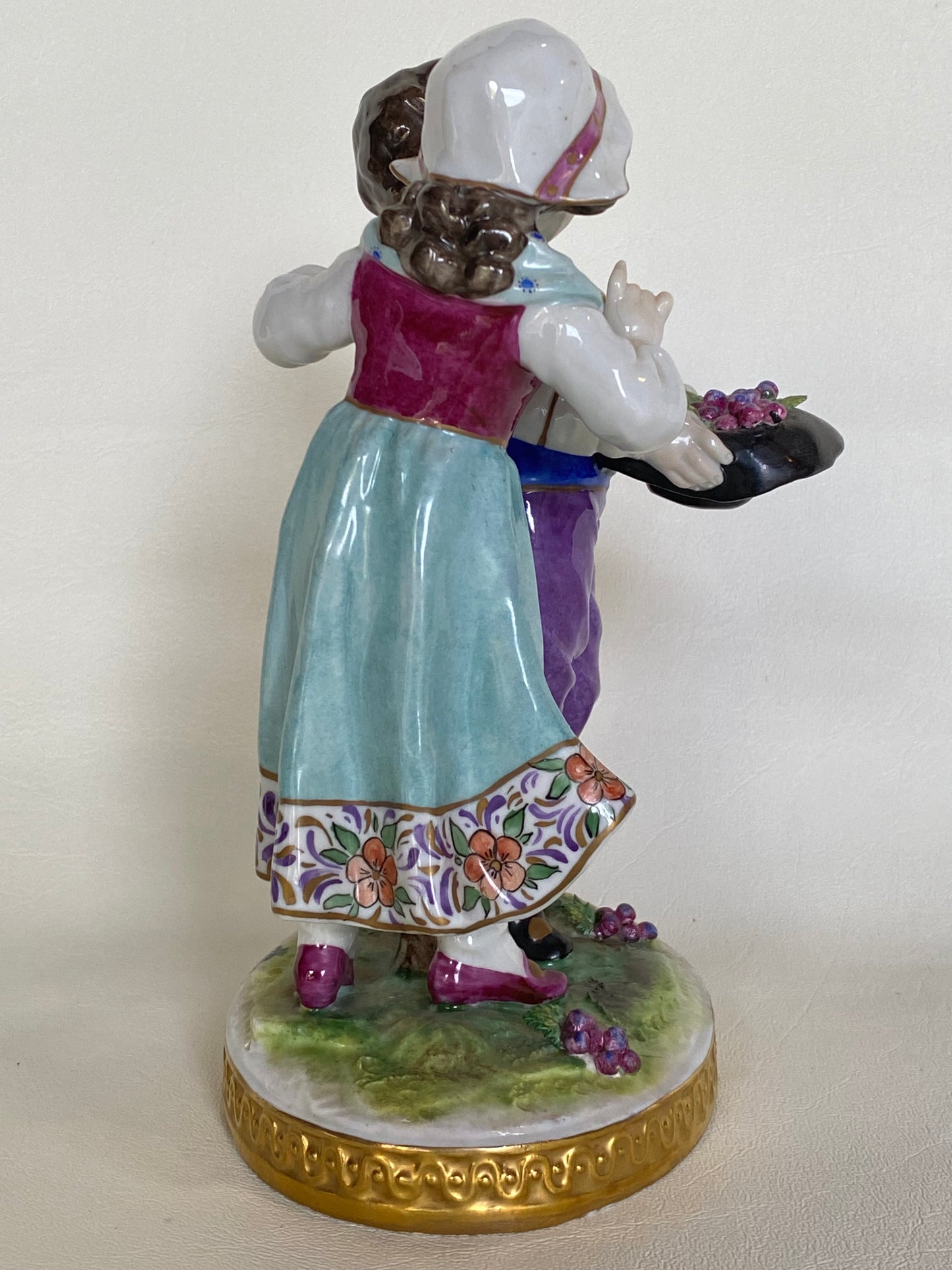 Volkstedt Figurine - Girl and boy harvesting grapes.