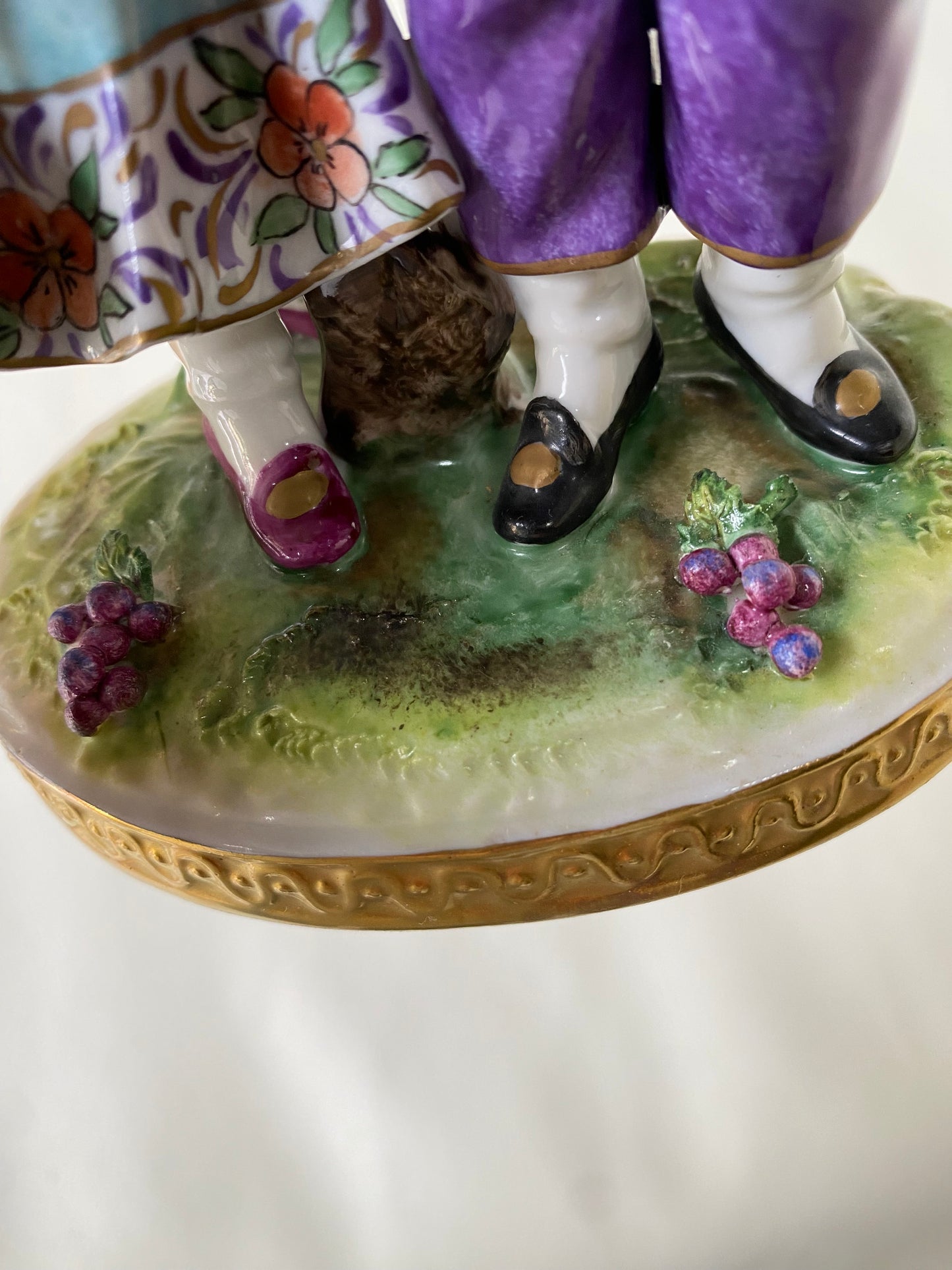 Volkstedt Figurine - Girl and boy harvesting grapes.