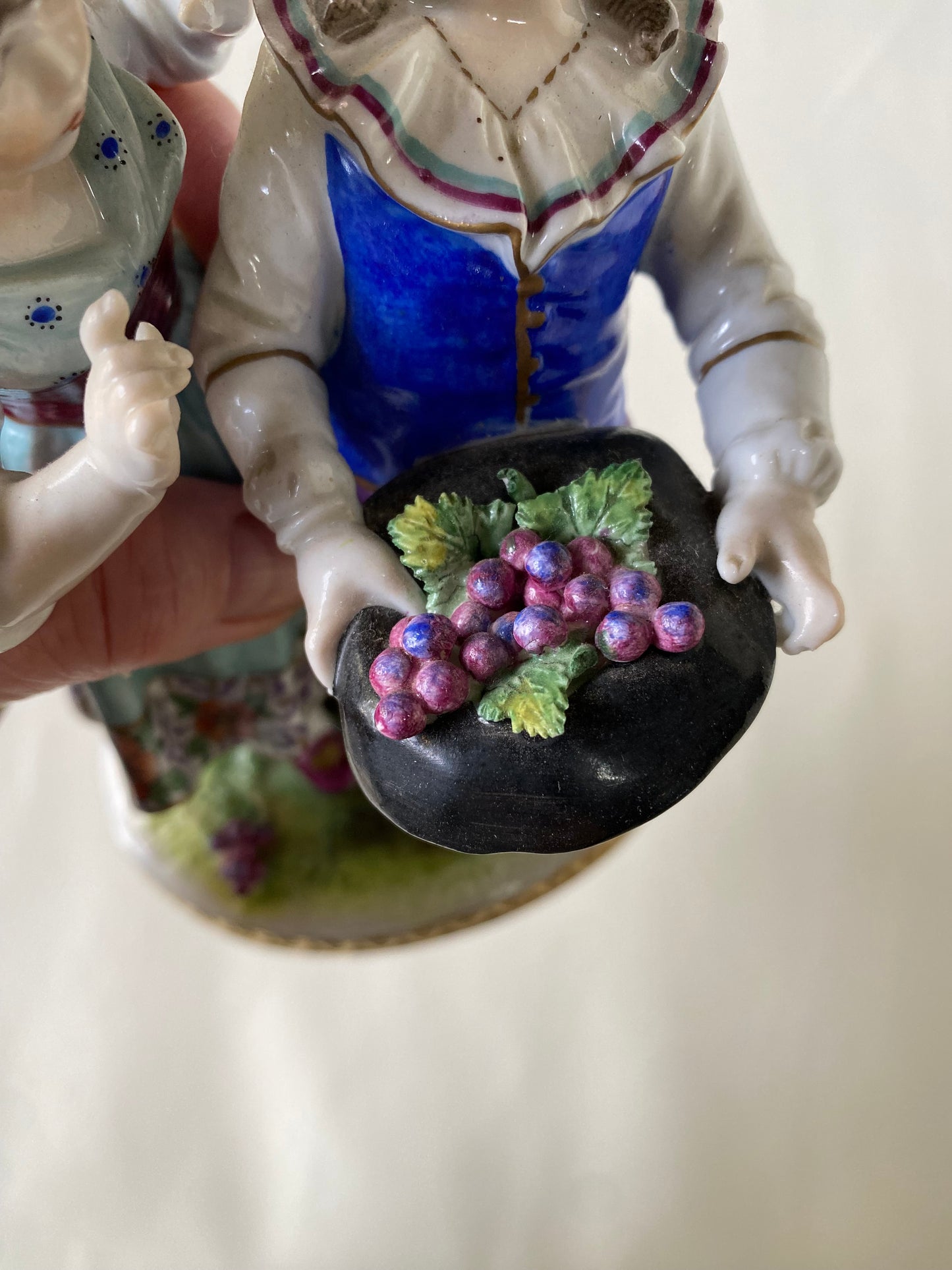 Volkstedt Figurine - Girl and boy harvesting grapes.
