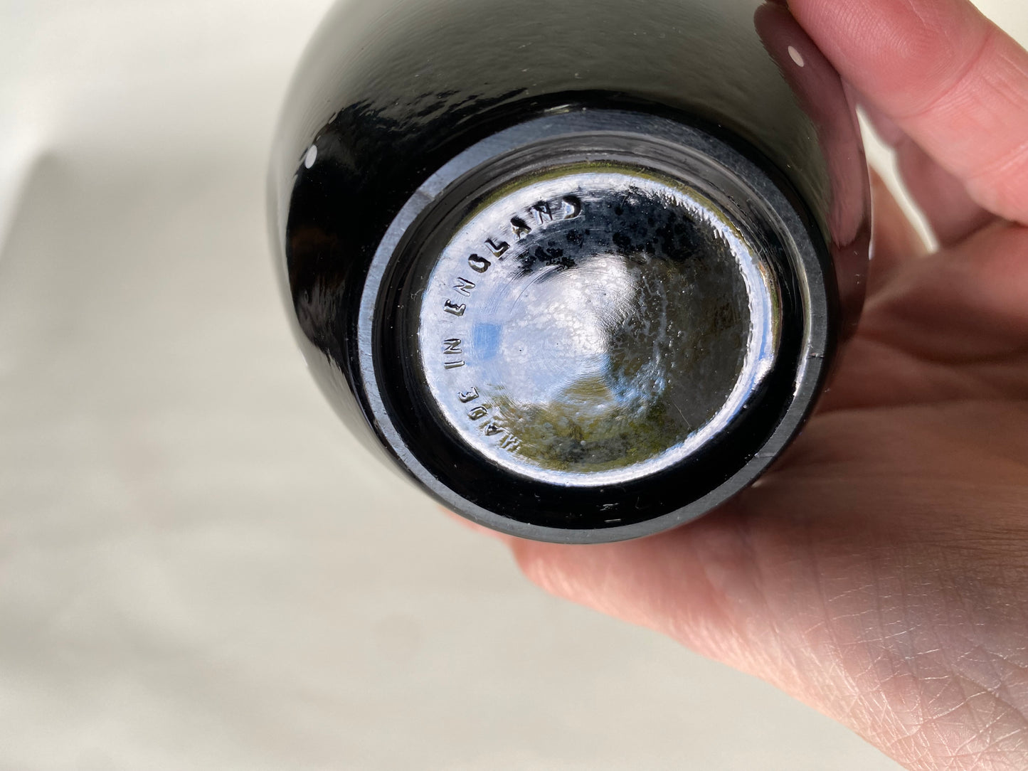 Vintage black glass with polka dots vase - England