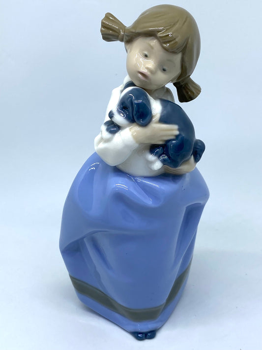 NAO by Lladró - Girl 'Daisa' Holding Puppy - 1987 - Porcelain Figurine
