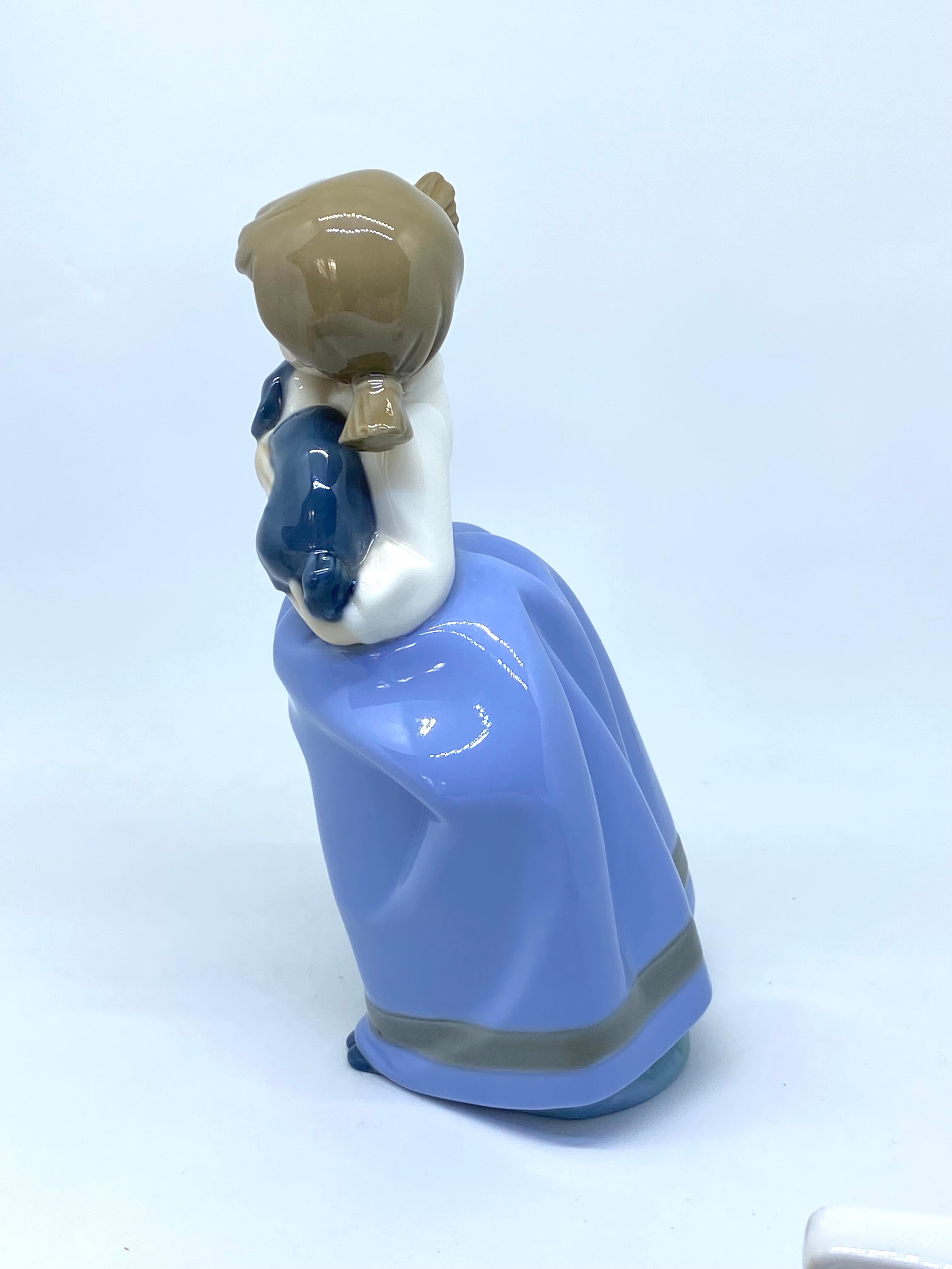 NAO by Lladró - Girl 'Daisa' Holding Puppy - 1987 - Porcelain