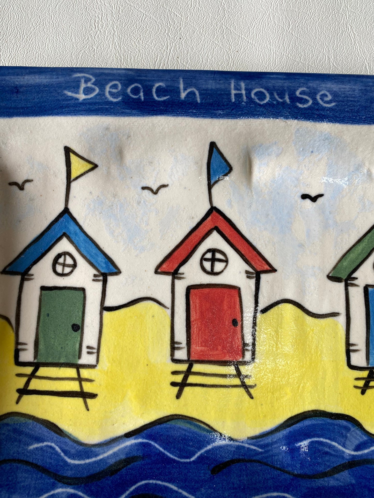 Carolyn 'Toselli Tasmania' beach house pottery plate