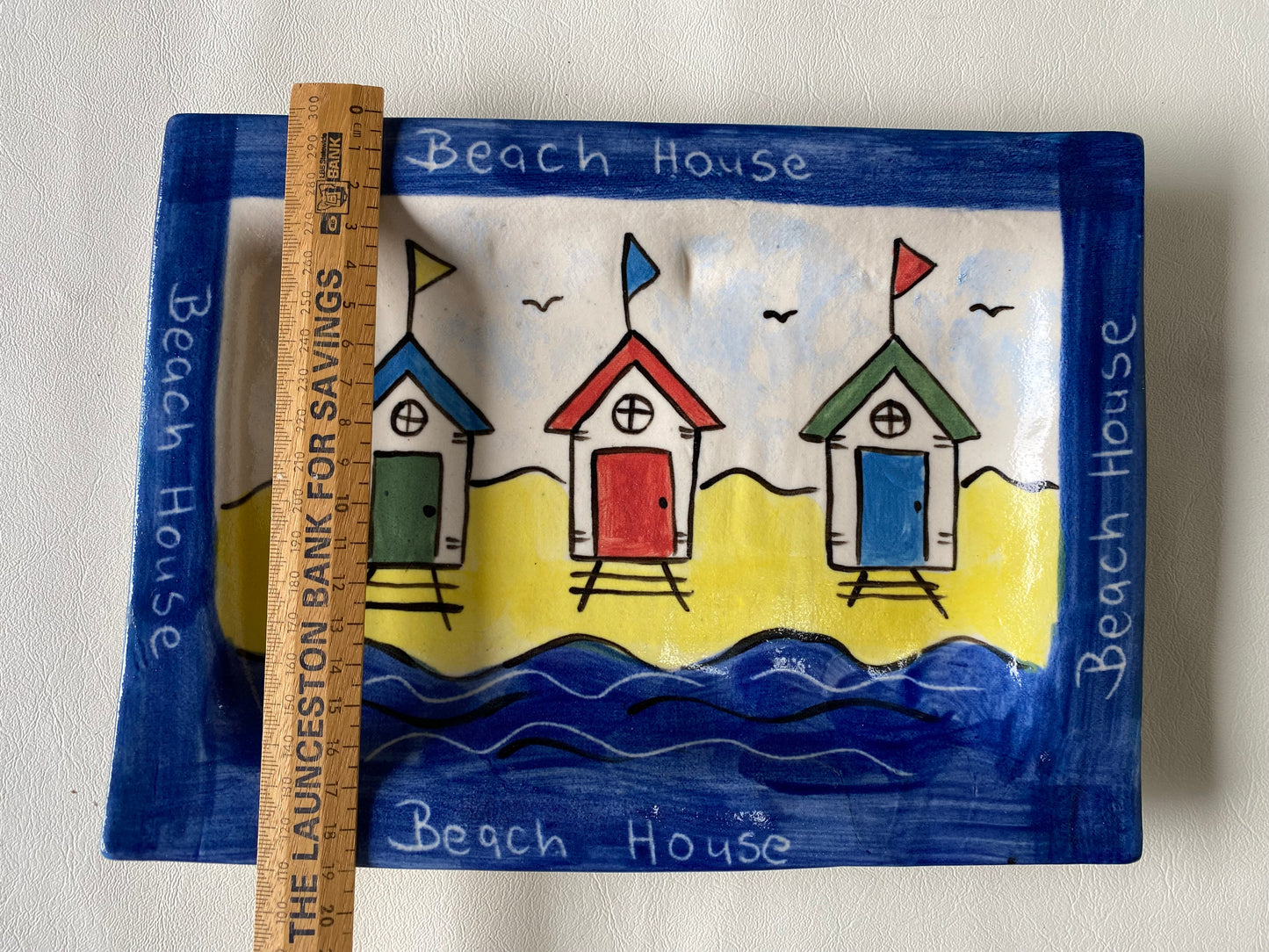 Carolyn 'Toselli Tasmania' beach house pottery plate