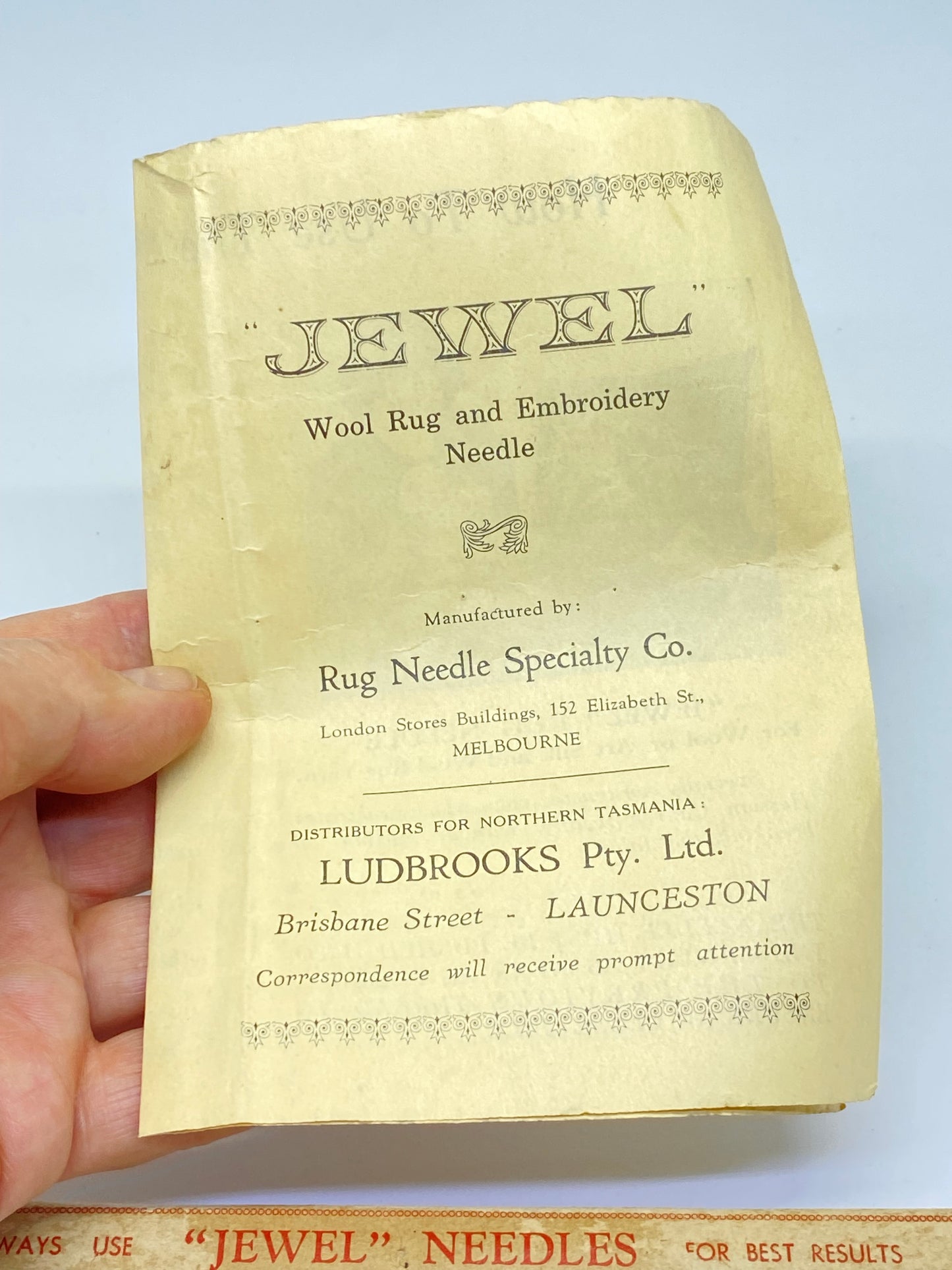 Antique Bakelite 'Jewel Rug Embroidery Needle' complete in box with instructions.