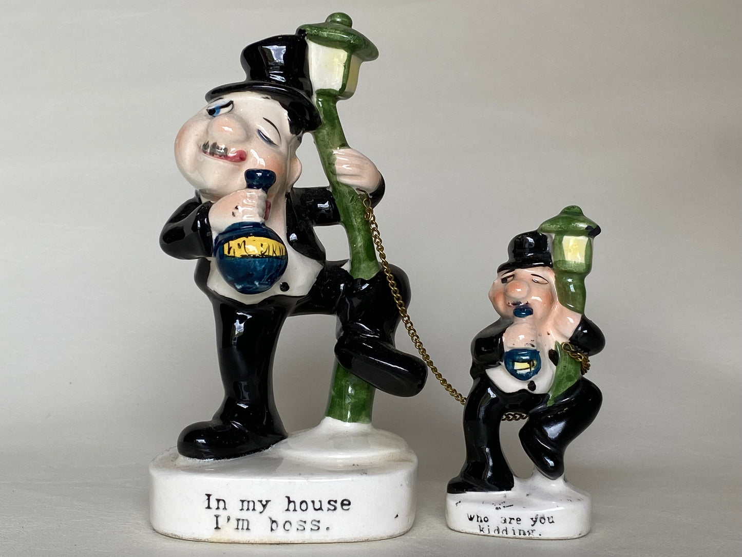 Vintage Japan ceramic drunk figurines.