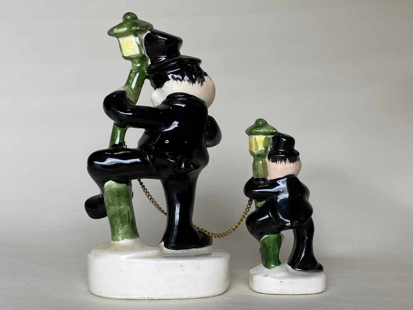 Vintage Japan ceramic drunk figurines.