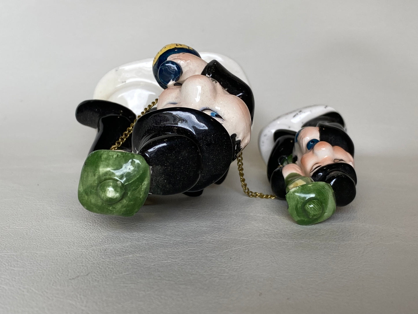 Vintage Japan ceramic drunk figurines.