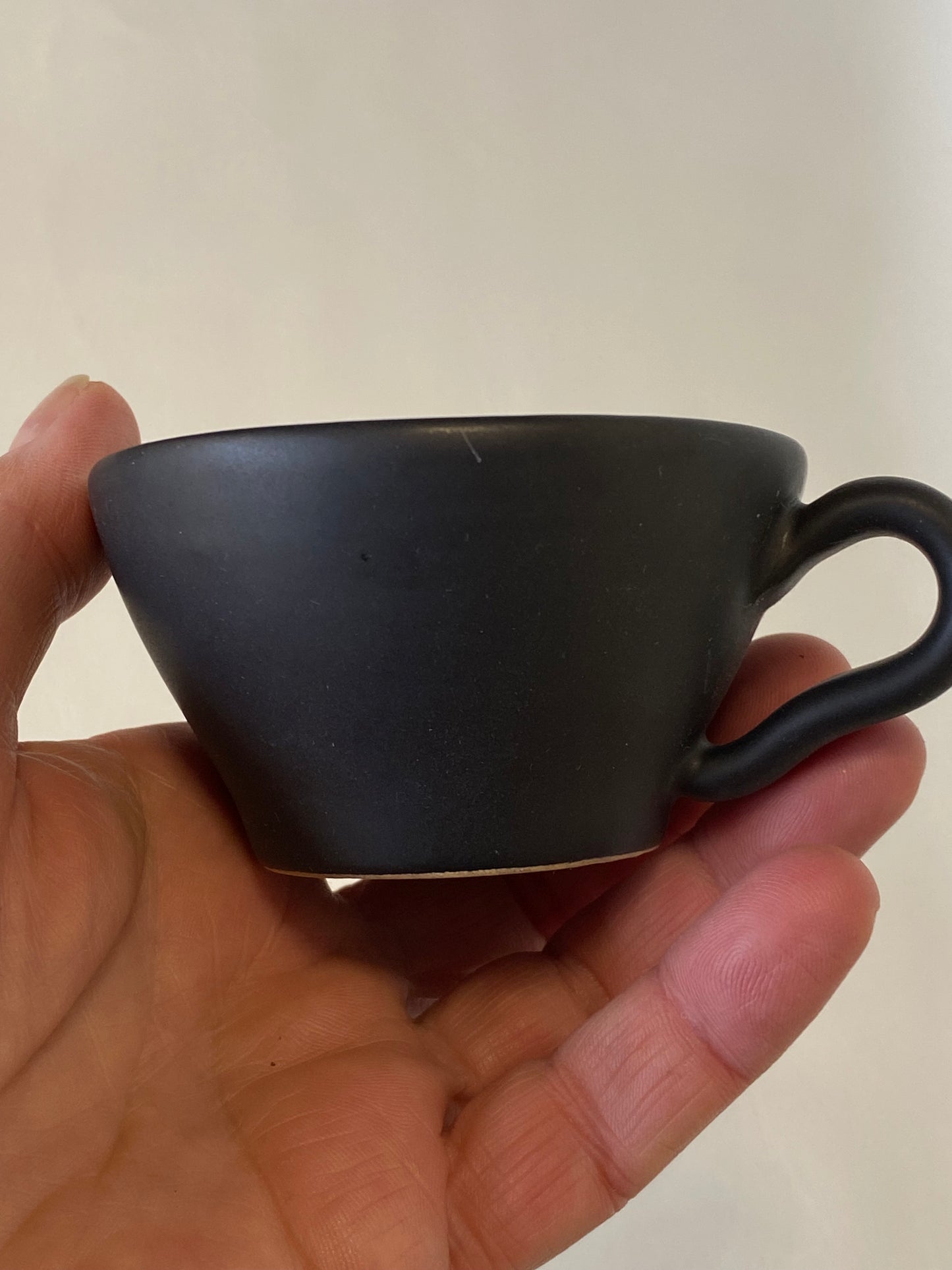 1960s Raynham Australia black and white glazed pottery demitasse cups and saucers