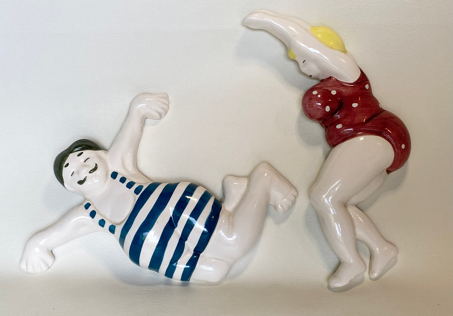 Beryl Cook style ceramic wall plaques - swimmers