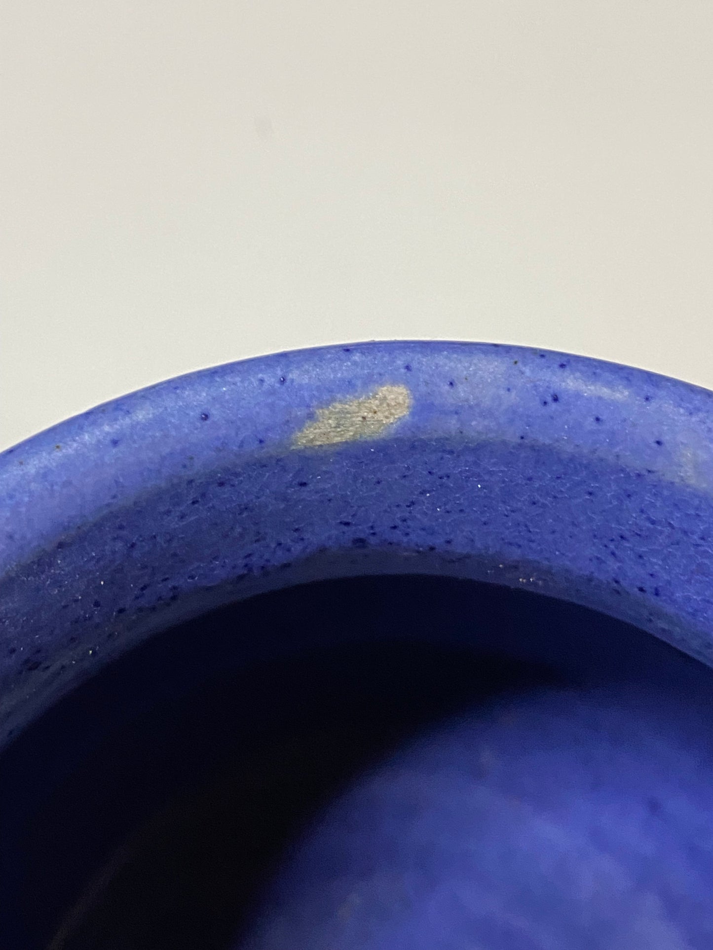 Where the glaze has not adhered (glaze miss) 