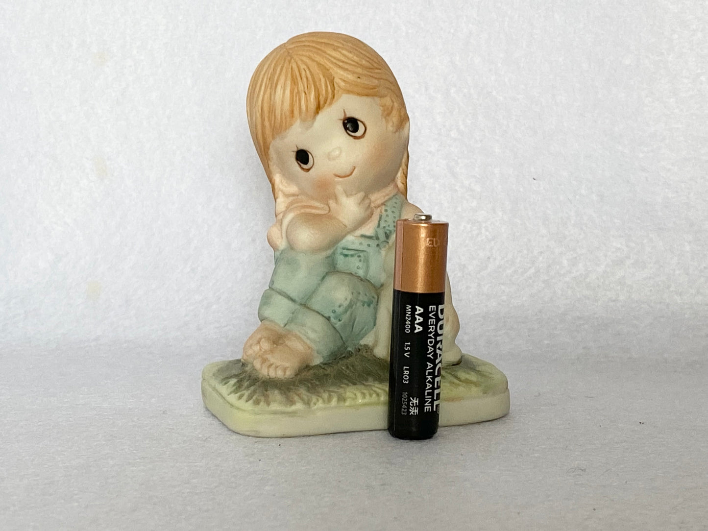 Vintage 1970s Thinking Girl Figure with original Taiwan sticker