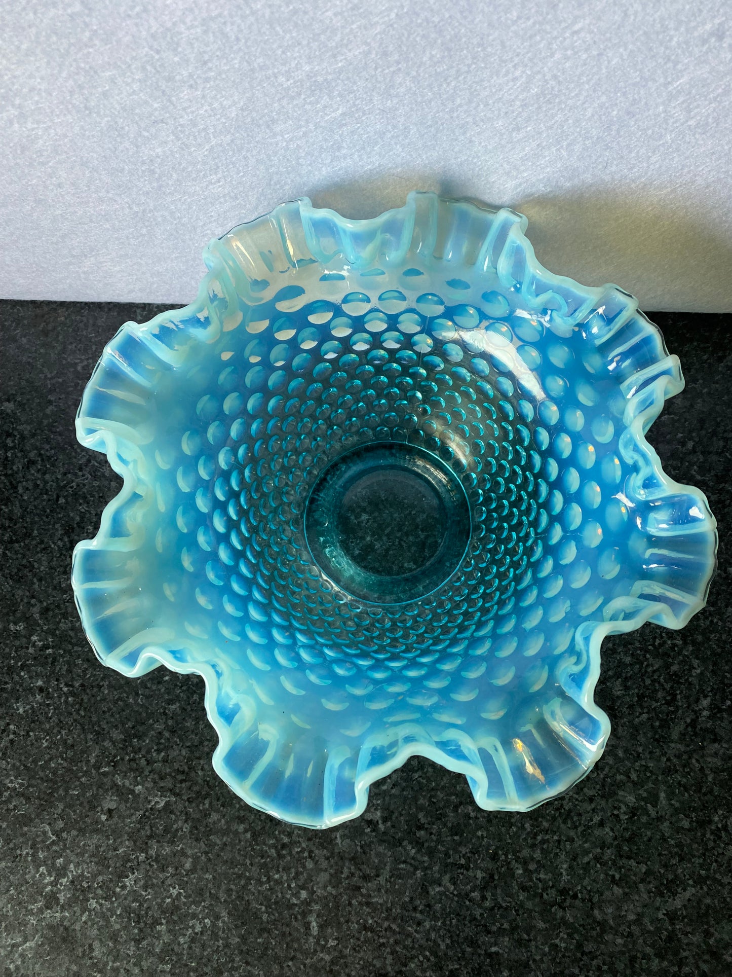 Beautiful Fenton blue opalescent hobnail bowl with original card with uranium base