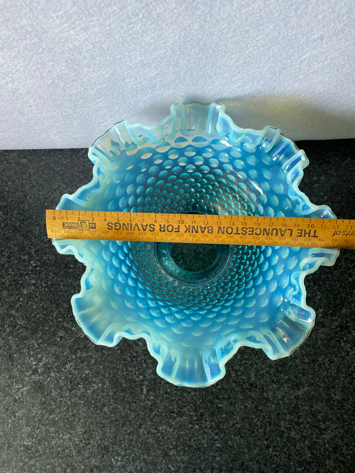 Beautiful Fenton blue opalescent hobnail bowl with original card with uranium base