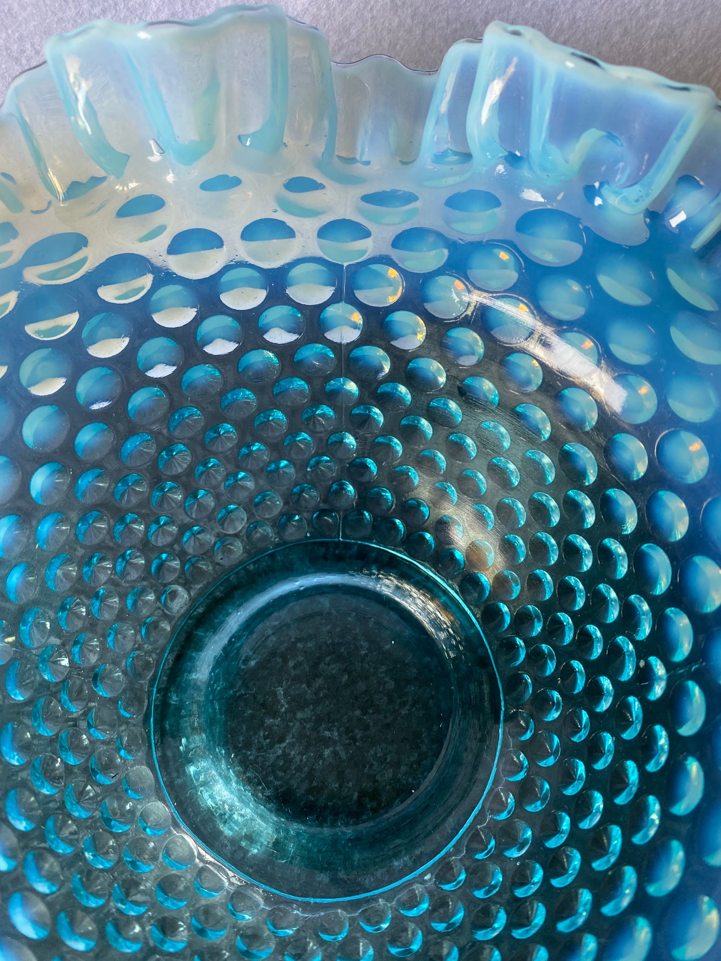 Beautiful Fenton blue opalescent hobnail bowl with original card with uranium base