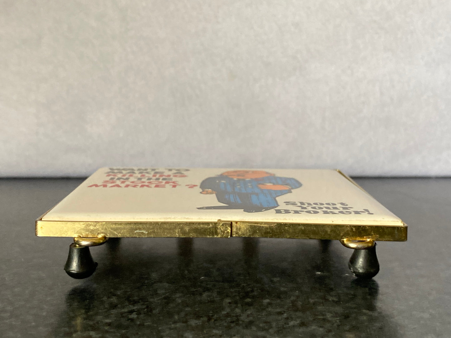 1960s satirical humour trivet- Wall Street - "Want to Make a Killing in the Stock Market?"