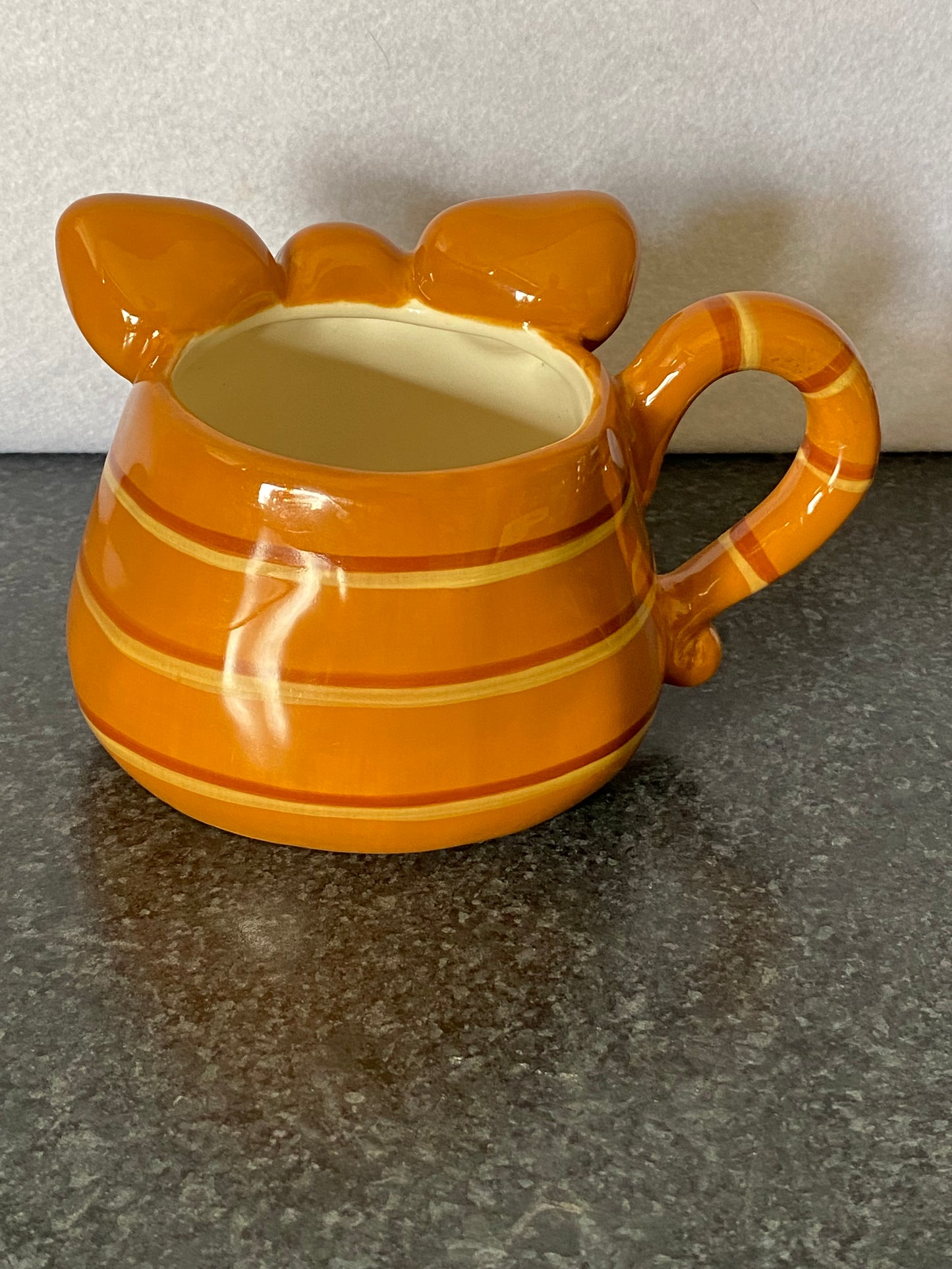 Russ Berrie Orange Tabby Cat face mug designed by Douglas Harris