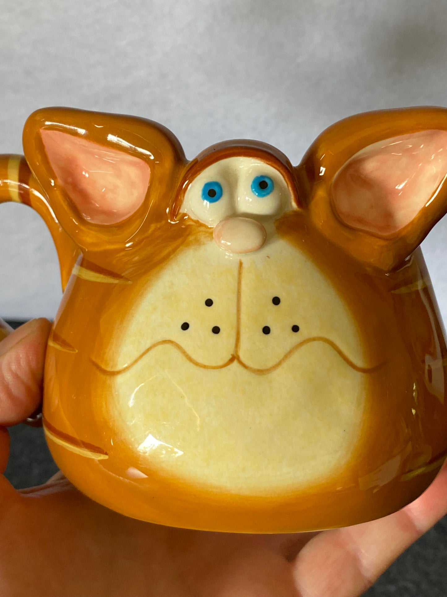 Russ Berrie Orange Tabby Cat face mug designed by Douglas Harris